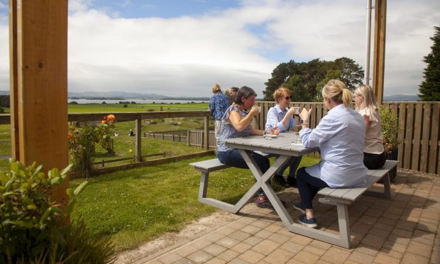 There are so many beautiful al fresco dining areas in Perthshire and Kinross, including at Loch Leven Larder's cafe. Image: Teresa Geissler.