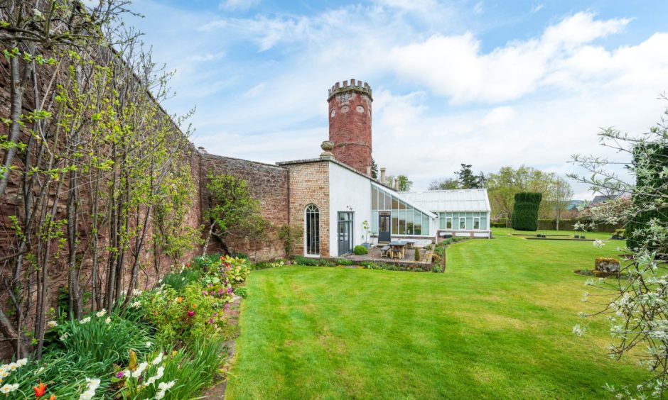 High stone walls surround 1 Arthurstone Gardens