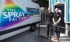 Charlie and Ally Small standing in front of The Spray Factory van