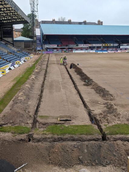 Work begins across the pitch. Image: Paul Murray