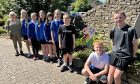 Whitehills pupils with one of their ice cream cones at Forfar Botanists' Garden. Image: Angus Council