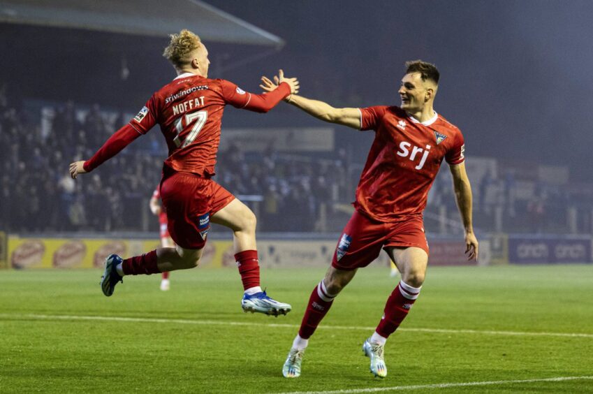 Josh Edwards celebrates a Dunfermline Athletic FC goal with team-mate Owen Moffat last season.