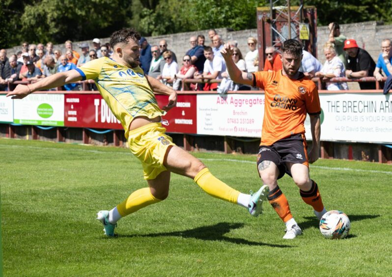 Will Ferry, right, in action for Dundee United 