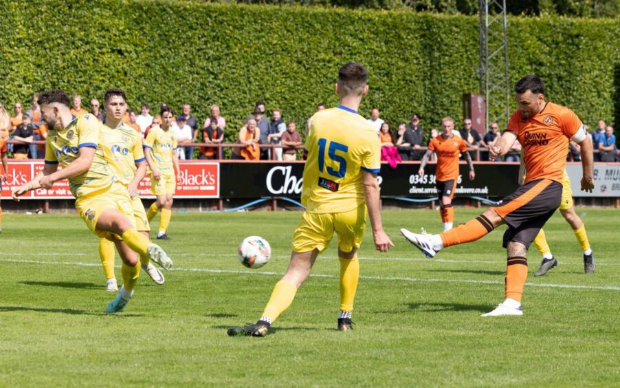 Tony Watt slams home Dundee United's second goal of the game at Brechin