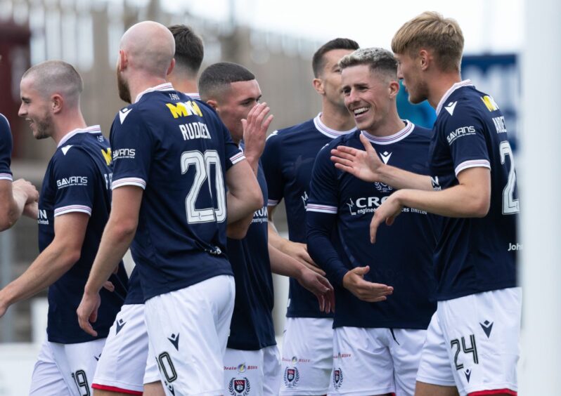 Dundee celebrate Max Anderson's (right) goal as they went 3-0 up at Arbroath. Image: Craig Foy/SNS