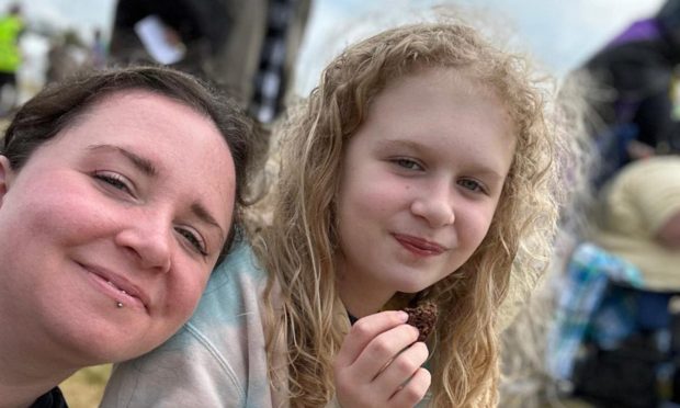 Dundee mum Danielle with her child Ash, 11, at Dundee Pride 2023. Image: Supplied.