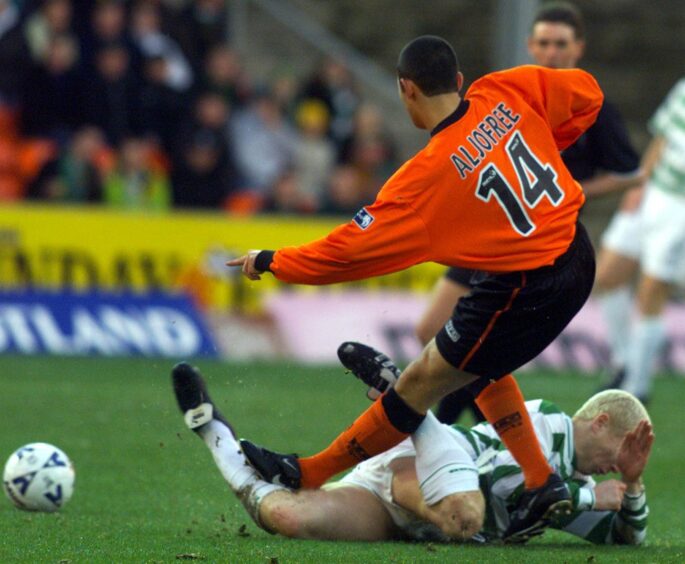 Hasney Aljofree gets stuck into Celtic's Neil Lennon