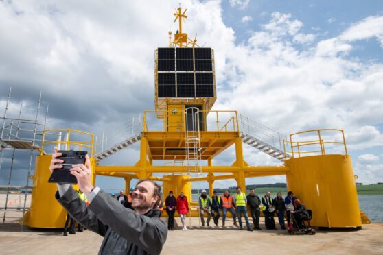 James Thomas, CEO of Jet Connectivity, takes a selfie at Port of Dundee in front of the massive 5G buoy which was built there.
Image: Alan Richardson/ Pix-AR