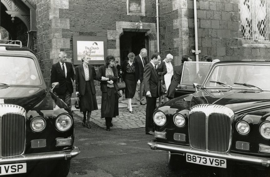 The family of Lynda Hunter leaving the church after her funeral. 
