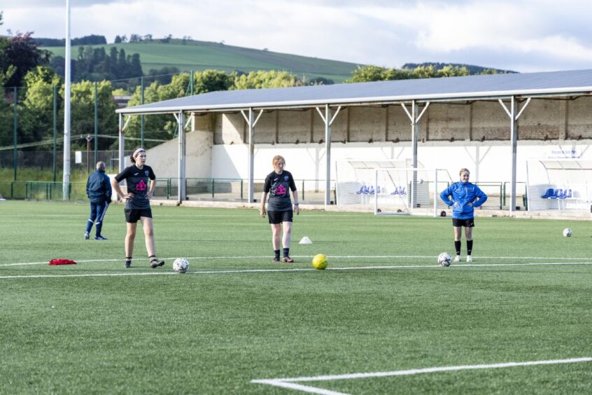 Women's football players training in Blairgowrie