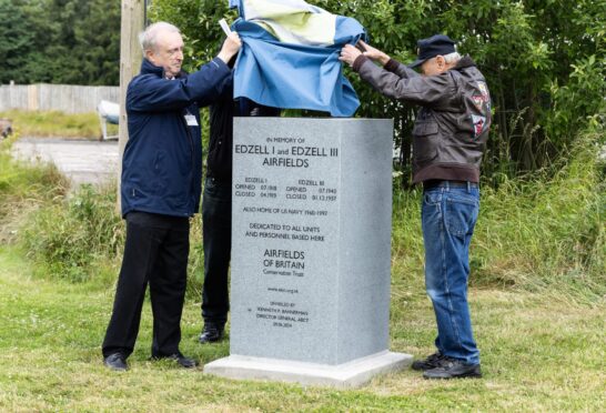 Airfields of Britain Conservation Trust director Kenneth Bannerman (left) leads the Edzell unveiling. Image: Ethan Williams