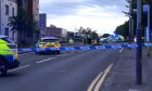 Police on Alexander Street in Dundee after the crash. Image: James Simpson/DC Thomson