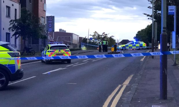 Police on Alexander Street in Dundee after the crash. Image: James Simpson/DC Thomson