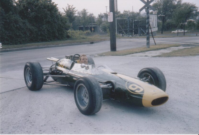 Derek Wild sitting in Jim Clark's Lotus Indycar. 