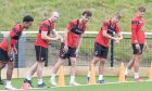 Dunfermline players get ready for some running on their first day of pre-season training.