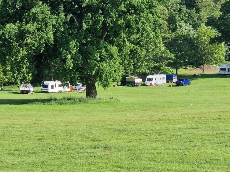 At least 11 caravans are part of the latest encampment. 