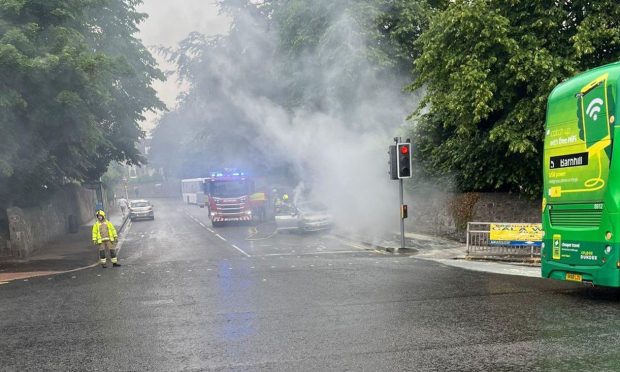 The car fire on Fort Street near the junction with Queen Street in Broughty Ferry. Image: Gareth Russell