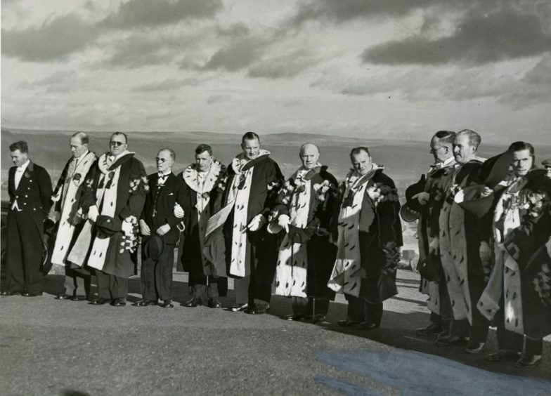 City magistrates in their robes attending a service at Dundee war memorial in November 1947.