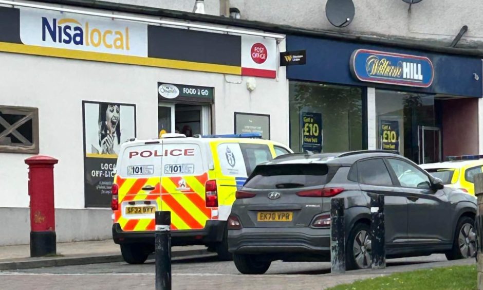 Police at the scene in Dunfermline.