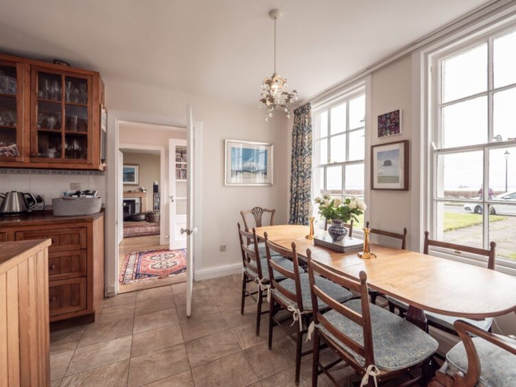 The dining area overlooks the front law. 