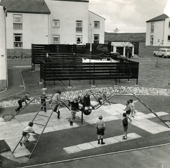 An aerial shot of children playing at the Menzieshill playpark in Dundee