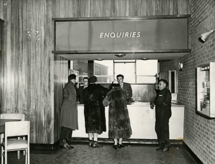 Travellers at the Enquiries booth at Tay Bridge Station in 1959. 