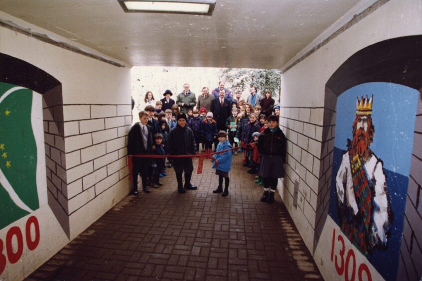 Ancrum Road Primary pupils cut the ribbon at the opening of the newly refurbished subway