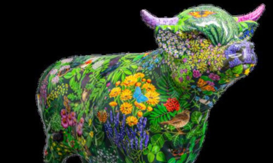 The Hairy Highland Coo Trail model named Healin Coo, painted all over with birds and flowers.