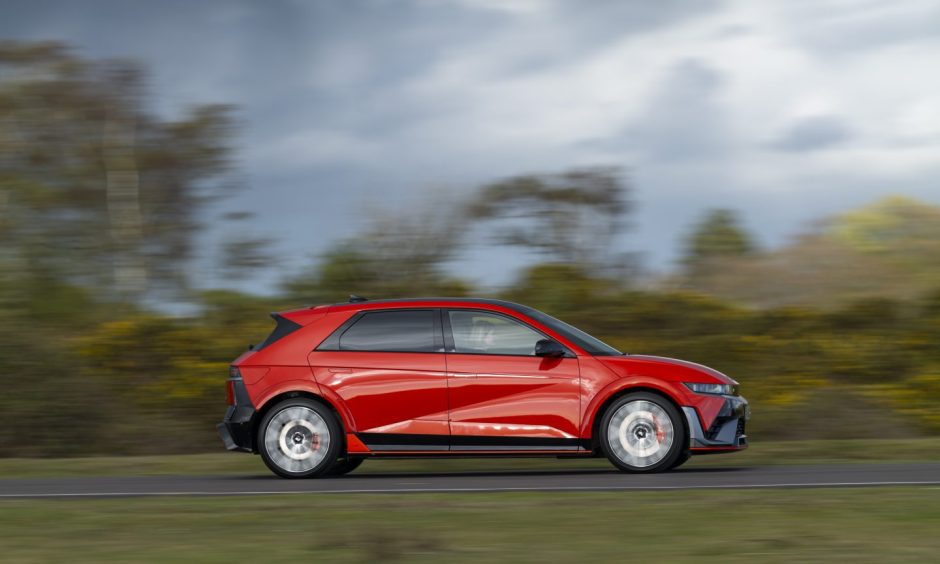 A sideways view of a Ioniq 5 N on the road