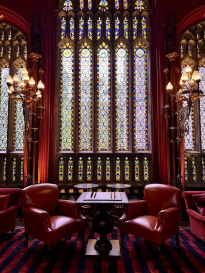 Elaborate stained glass window at Taymouth Castle.