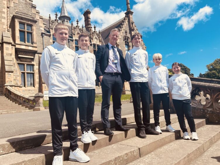 Morgan Academy headteacher Johnny Lothian with karate pupils.