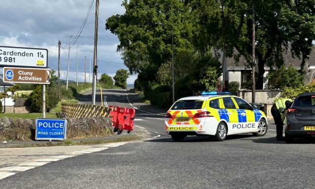 Police blocking the B922 in Cluny. Image: Neil Henderson/DC Thomson
