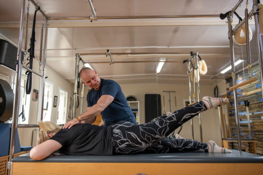 Debbie trying out matwork pilates. 