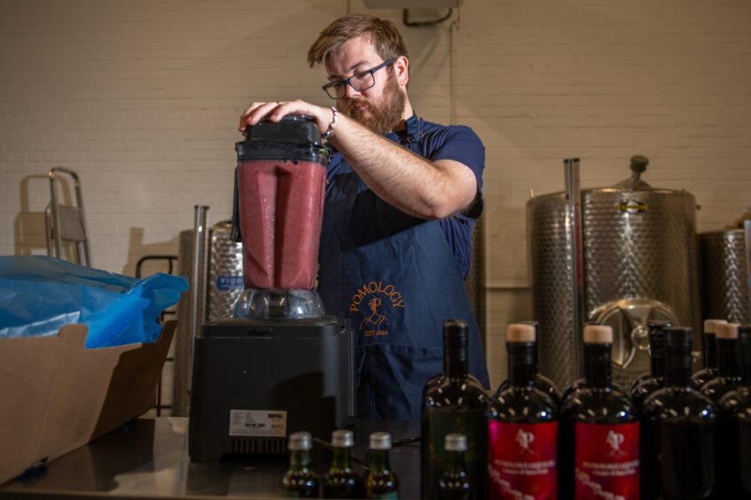 Craig Brownhill liquidising some strawberries for a batch of liqueur.