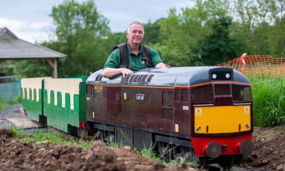 Andy Foster drives the train on the new Scottish Deer Centre track