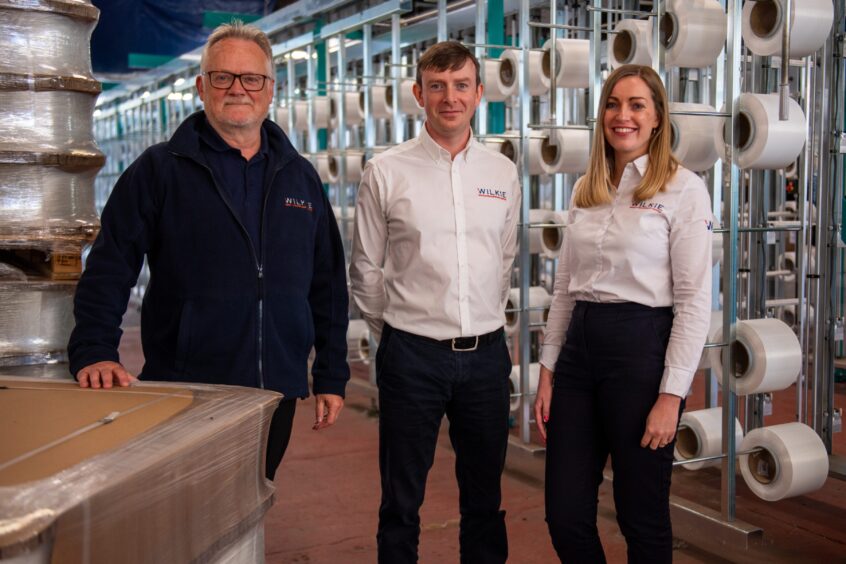 Wilkie general manager John Reid, chief executive Hamish Rowan and sales director Paula Robertson at the Kirriemuir factory.