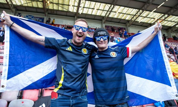 Fans Andrew Glen from Glenrothes and Kaiden Leverington from Lochgelly at the Dunfermline fan zone on Friday. Image: Kenny Smith/DC Thomson