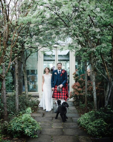 Jamie and Laura Fyfe were delighted to be able to include their Cockpoo Jasper in their wedding at the Landmark Hotel in Dundee. Image: Andi Watson Photography.