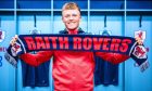 Lewis Gibson holds up a Raith Rovers scarf.