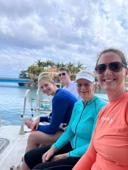 Liz pictured with daughter Rhona and her grandchildren during a trip to the Caribbean this year.