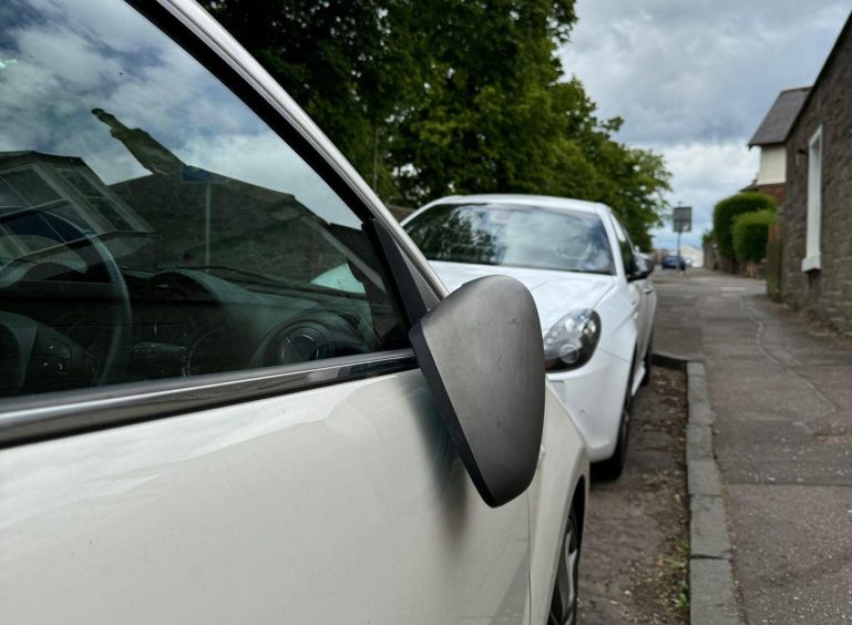 One of the damaged cars on mains Loan