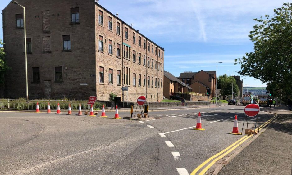 burst water main closes Dundee road