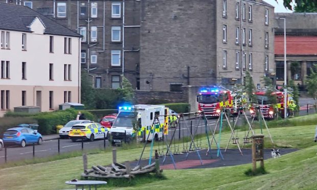 Emergency services at the scene of the Moncur Crescent crash