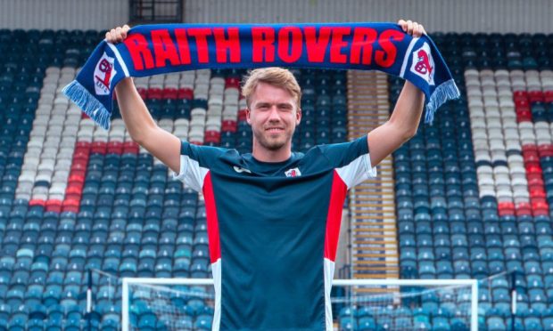 New signing Kieran Freeman with a Raith Rovers scarf.