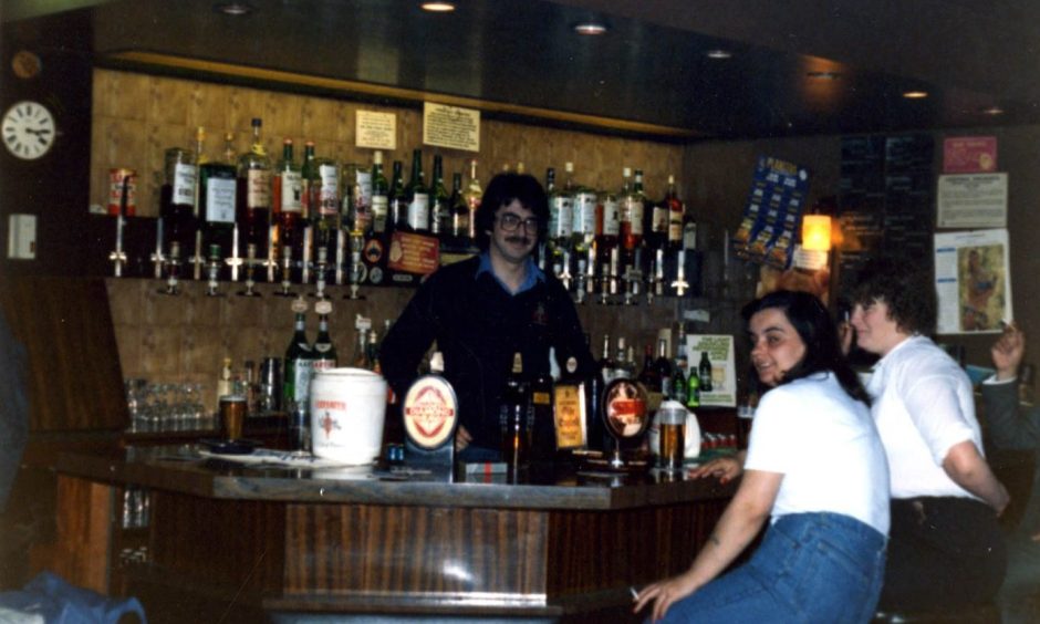 Drinkers sit at the bar in The Cavern in 1984.