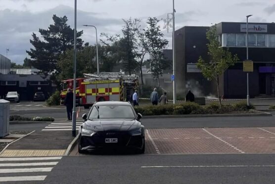 Firefighters tackling underground fire on North Street in Glenrothes.