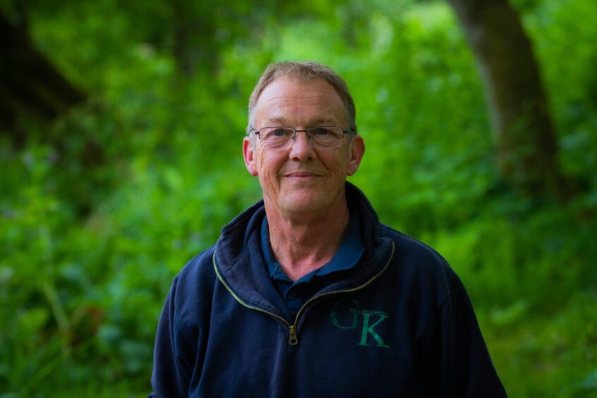 Robert Kellie standing among greenery beside River Ericht