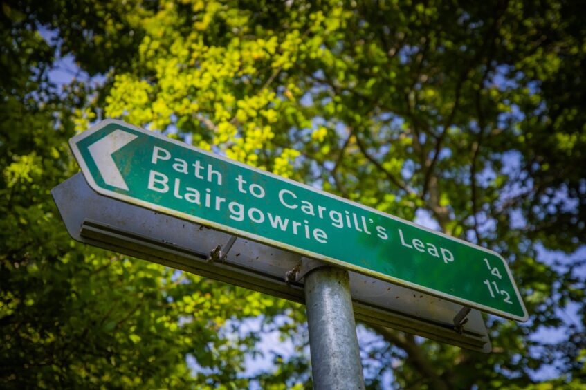 Sign pointing ti Path to Cargill's Leap