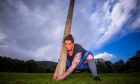 Highland Games competitor Rebecca Maeule practises her caber tossing at Pitlochry Recreation Park. Image: Steve MacDougall/DC Thomson.