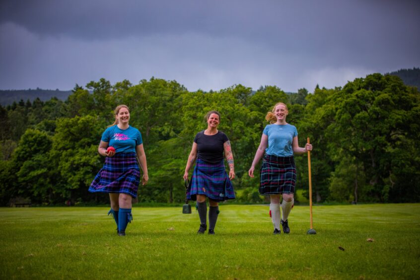 Highland Games girls Laura Barber, Rebecca Maeule and Ruadh McIntosh in Pitlochry Recreation Park. Image: Steve MacDougall. 